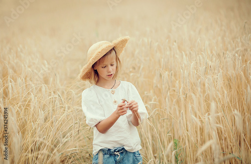 young woman in a wheat field