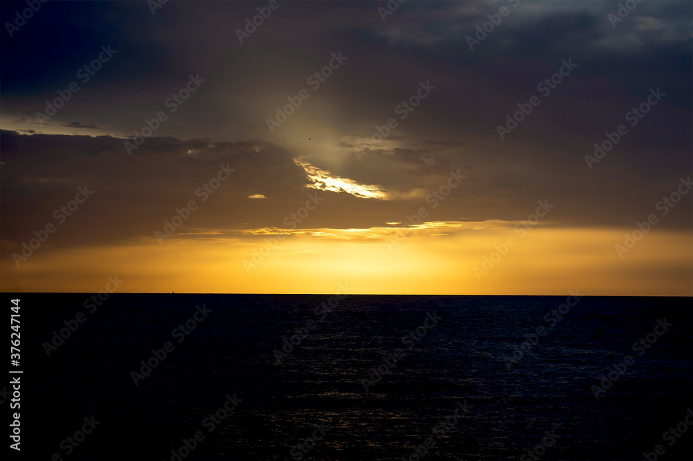 Sunset with a deep gold in the Colombian Caribbean.