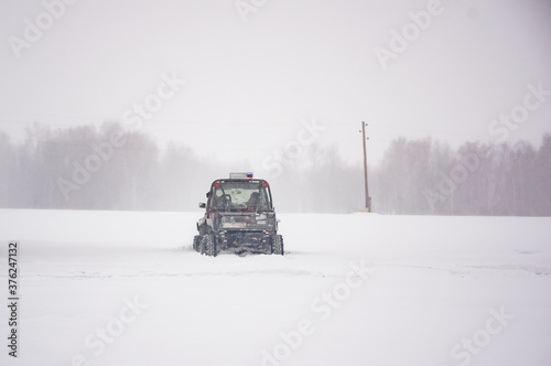 car driving in deep snow
