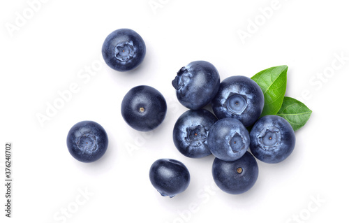 Top view group of fresh Blueberries with green leaves isolated on white background.