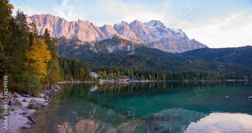 beautiful turquoise lake Eibsee, tourist attraction near Zugspitze mountain, in the evening