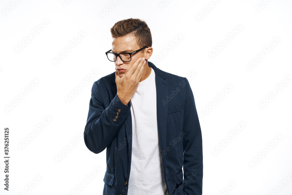 Business man in a jacket with glasses emotions official manager light background studio Business man in a jacket with glasses emotions official manager light background studio