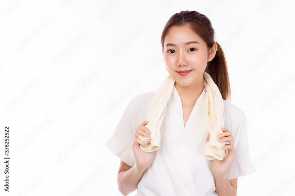 Beautiful asian young woman holding towel and wear bathrobe in bathroom after finished shower with smile face. Attractive beautiful girl get refreshing after bath. white background and copy space Beautiful asian young woman holding towel and wear bathrobe in bathroom after finished shower with smile face. Attractive beautiful girl get refreshing after bath. white background and copy space