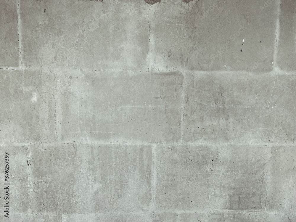 Closeup on grey stone outdoor bricks wall texture