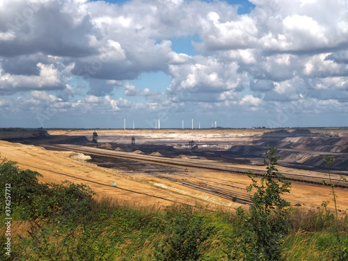 Lignite mining, surreal landscape in Garzweiler in Germany, searching for brown coal photo