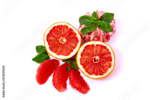 Fototapeta Naklejka Na Ścianę i Meble -  grapefruit with mint, juicy fresh , slices, top view on a white background., horizontal