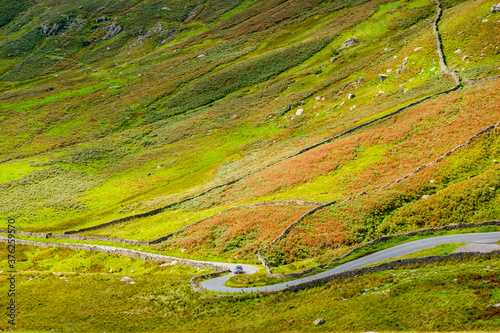 The Struggle road at Kirkstone Pass leading to Windermere lake Ambleside Lake District England