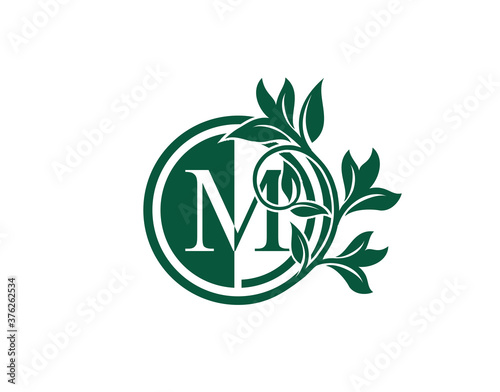 Luxury Circle M Letter Floral Logo. Nature M Swirl Logo Icon.