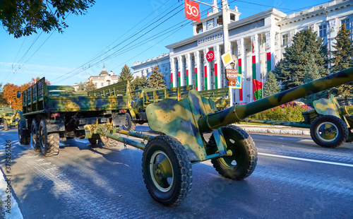 Tiraspol, Transnistria - September 2, 2020: military parade dedicated to the 30th anniversary of independence, ordered military equipment and weapons, inscription in Russian - house of Soviets