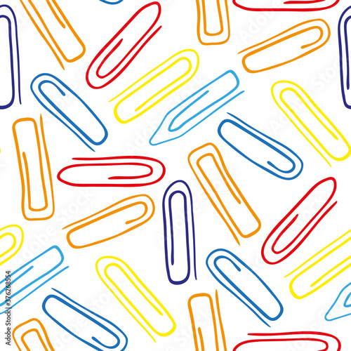 Bright multicolored paper clips isolated on white background. Cute colorful seamless pattern. Vector graphic hand drawn illustration. Texture.