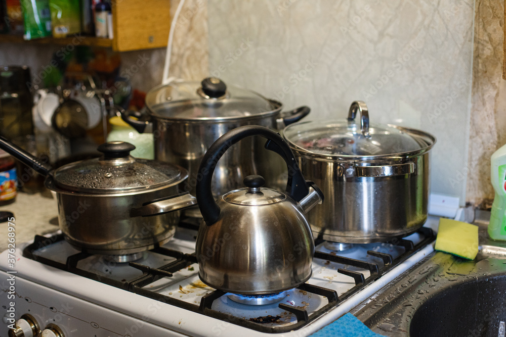 Picture with a lot of cookware. Cooking in the kitchen Picture with a lot of cookware. Cooking in the kitchen