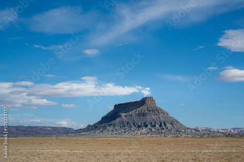 Factory Butte with clouds that look like smoke