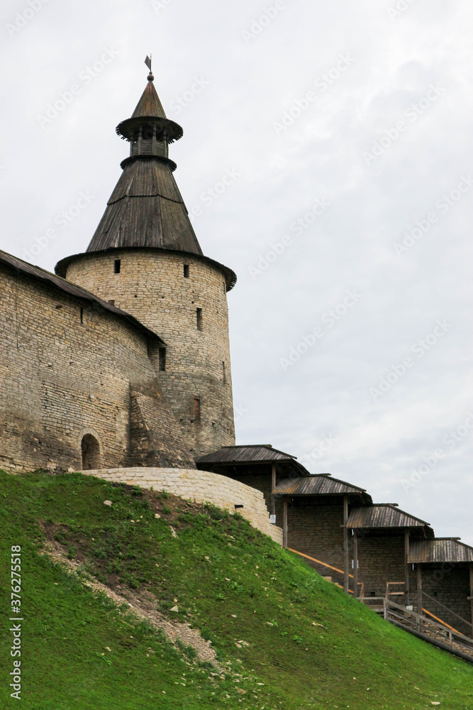 The bonfire tower with wooden roof of Pskov kremlin (krom) medieval fortress, famous landmark of Russia
