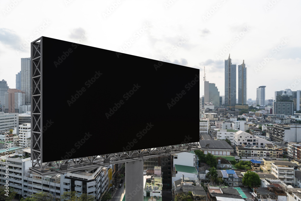 Blank black road billboard with Bangkok cityscape background at day time. Street advertising poster, mock up, 3D rendering. Side view. The concept of marketing communication to promote or sell idea. Blank black road billboard with Bangkok cityscape background at day time. Street advertising poster, mock up, 3D rendering. Side view. The concept of marketing communication to promote or sell idea.