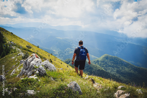 Young man hiking in mountains, Trebevic Mountain Bosnia & Herzegovina 