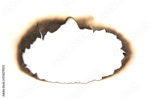 Canvastavla Fire burned hole white paper background texture