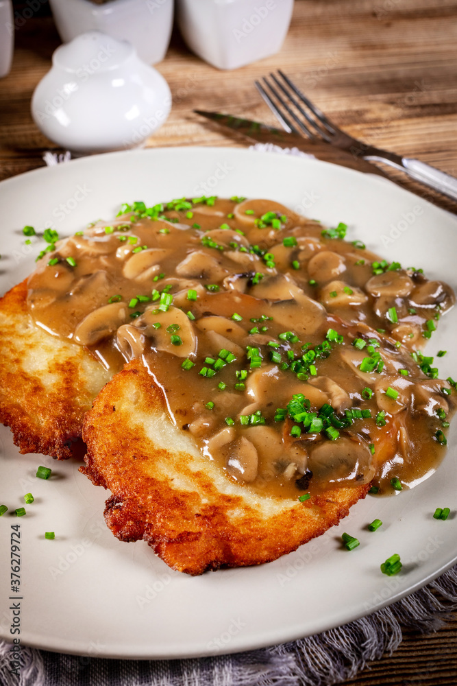 Crispy potato pancakes with mushroom sauce Crispy potato pancakes with mushroom sauce