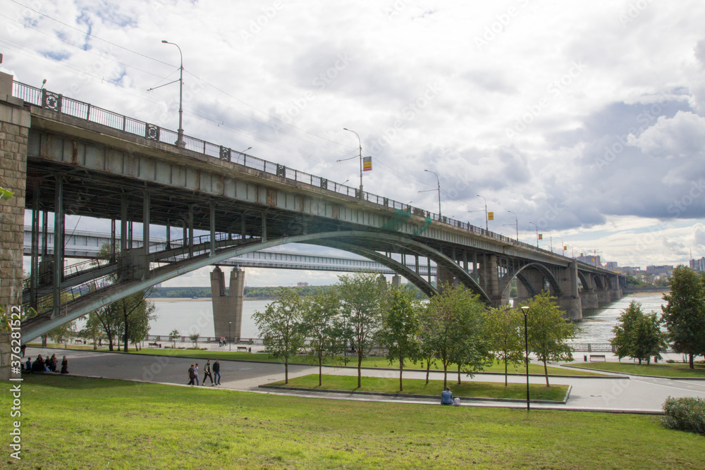 Bridges over the Ob river in Novosibirsk. The world's largest metro bridge and Communal bridge across Ob river in Novosibirsk, Russia