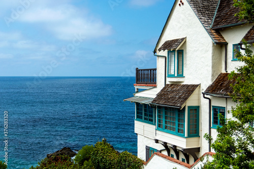 Exterior of 1929 English Tudor-style home with spectacular ocean views in Wood's Cove, is registered as a historic structure.