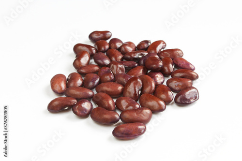 Handful of red kidney beans isolated on white background