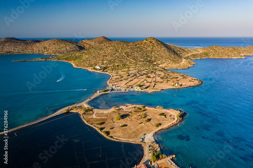 Aerial view of Elounda in Crete showing the sunken remains of the ancient Minoan city of Olous