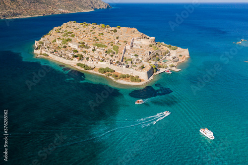 Aerial view of the ancient ruined Venetian fortress of Spinalonga island, Crete, Greece