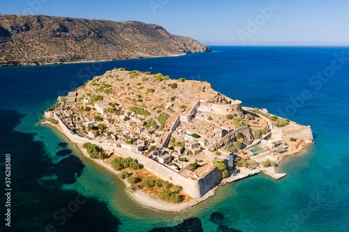 Aerial shot of the former Leper colony of Spinalonga island near Plaka, Crete, Greece