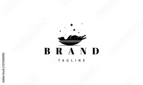 Vector logo on which an abstract image of a sleeping cat in a bowl.