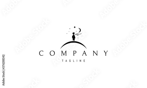 Vector logo on which an abstract image of a dreaming little boy with a developing scarf.