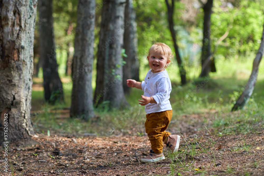 a lonely child walking in the park a lonely child walking in the park