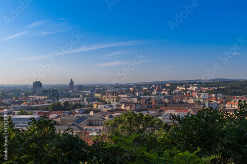 A view of the city of Brno in the Czech Republic in Europe. In the background is a blue sky with clouds.