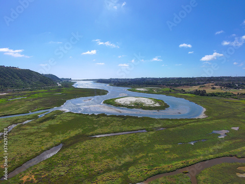 a stunning aerial shot of the deep blue waters and the lush green trees at batiquitos lagoon in Carlsbad California photo