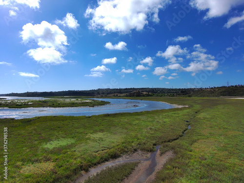 a stunning aerial shot of the deep blue waters and the lush green trees at batiquitos lagoon in Carlsbad California photo