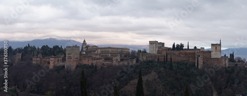 La Alhambra Castle and Fortress complex during night in Granada, Andalusia, Spain.