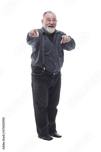 casual elderly man pointing at you. isolated on a white