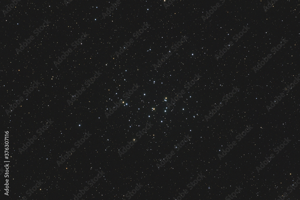 Starfield with the Beehive cluster (M44) in Cancer Constellation
