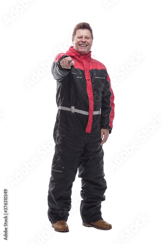 happy man in winter insulated overalls. isolated on a white