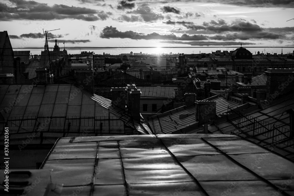 Obraz premium Roofs of St.Petersburg twilight. Black and white photo.