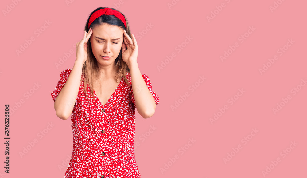 Young beautiful girl wearing dress and diadem with hand on head, headache because stress. suffering migraine. Young beautiful girl wearing dress and diadem with hand on head, headache because stress. suffering migraine.