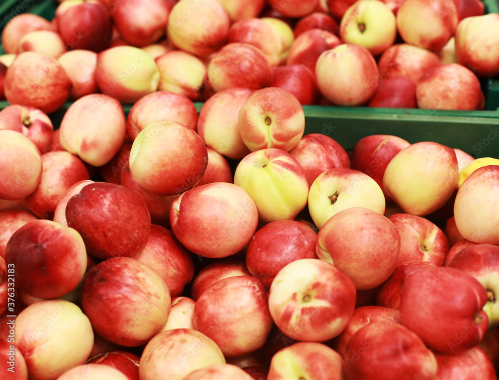 peaches on sale, in a store, peaches on sale, in a store,