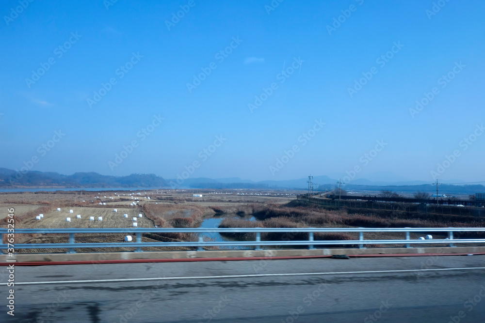 Rivers and crops on the side of the highway