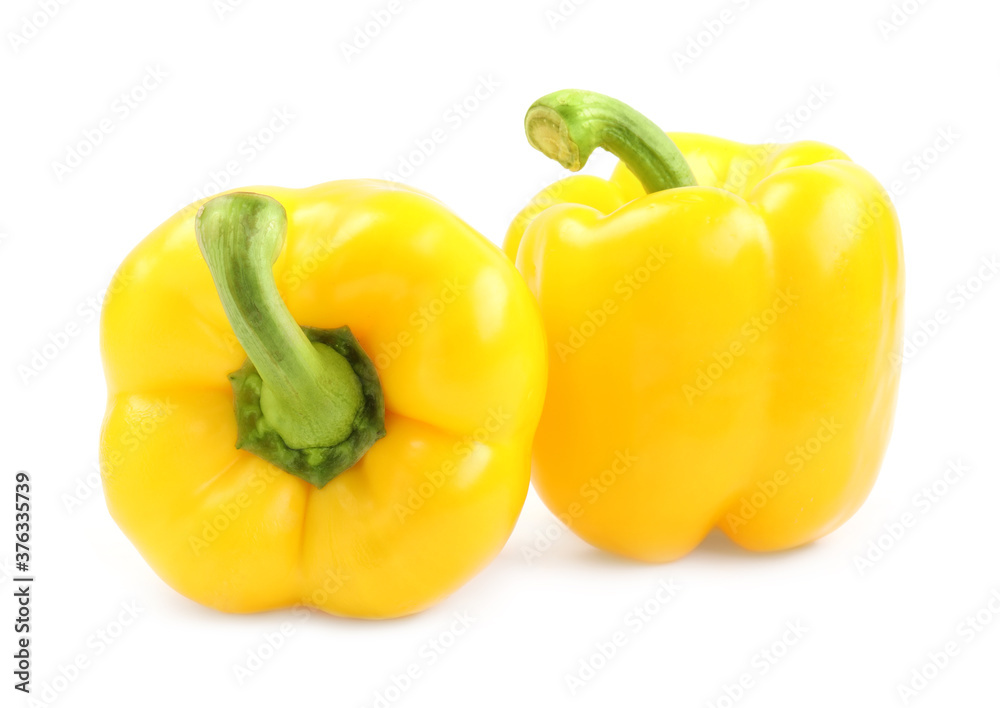 Ripe yellow bell peppers isolated on white Ripe yellow bell peppers isolated on white