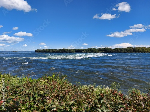 Fototapeta Naklejka Na Ścianę i Meble -  Lachine Rapids view seen from the Rapids Park in Montreal, Quebec, Canada on s sunny summer day
