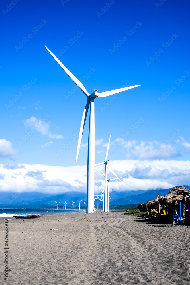 Wind Turbines along the White Sand Beach Coast