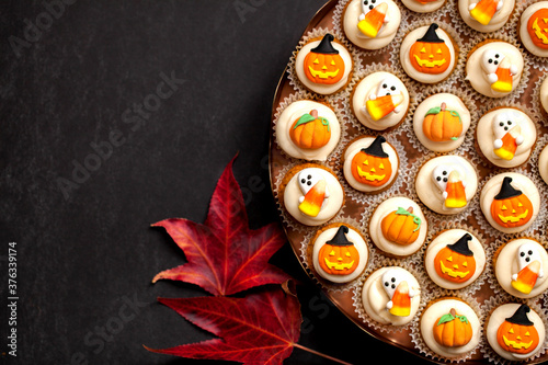 halloween mini cupcakes with red fall leaf, copper tray,