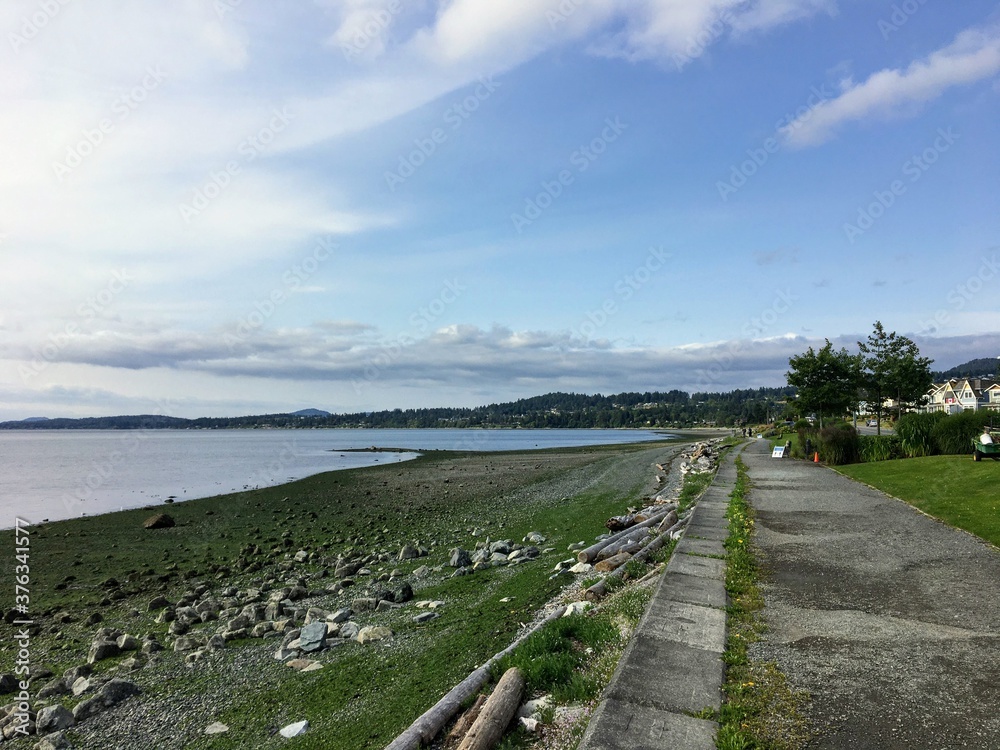 a walking path overlooking the ocean in the beautiful town of Sidney, British Columbia, Canada.