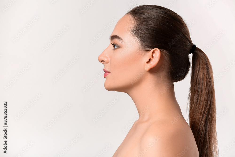 Young woman with acne problem on white background Young woman with acne problem on white background