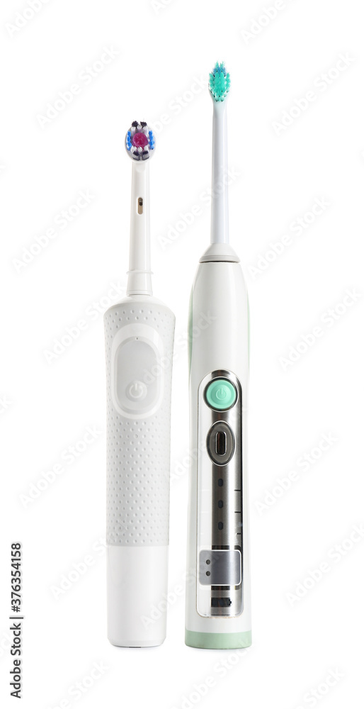 Electric tooth brushes on white background Electric tooth brushes on white background