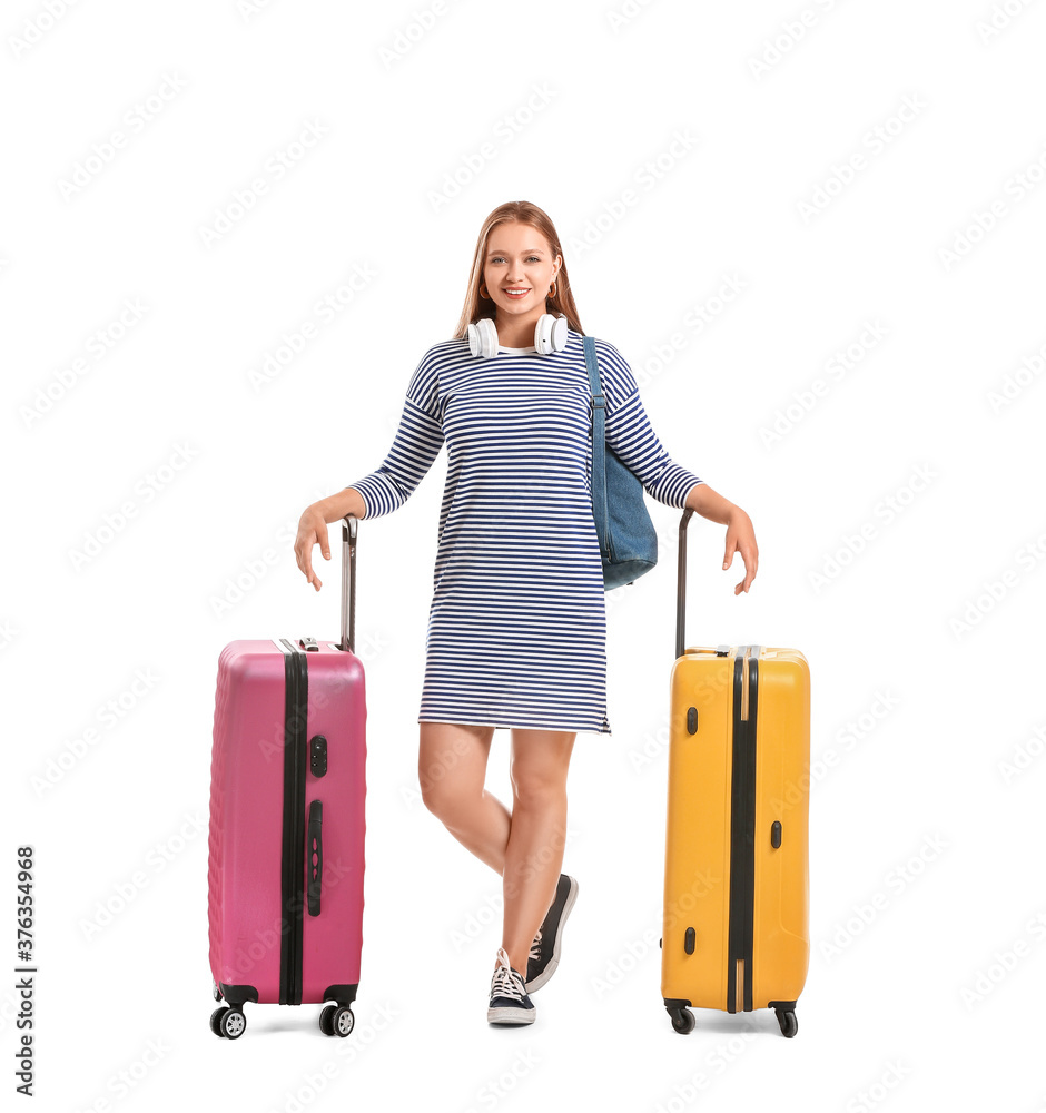 Young woman with suitcases on white background. Travel concept Young woman with suitcases on white background. Travel concept