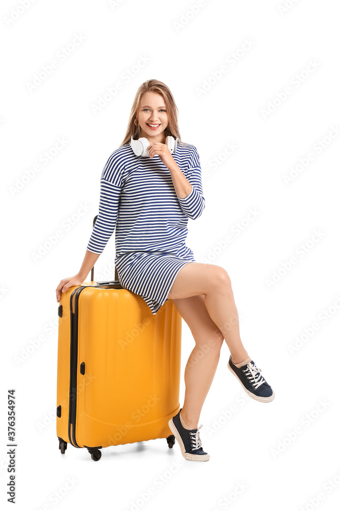 Young woman with suitcase on white background. Travel concept Young woman with suitcase on white background. Travel concept